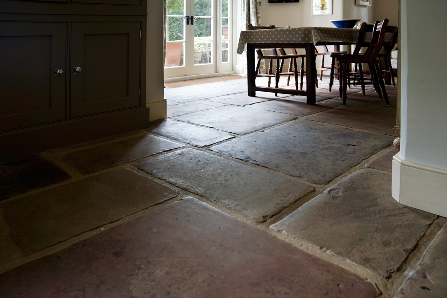 <span>Stone Floors</span><i>→</i>